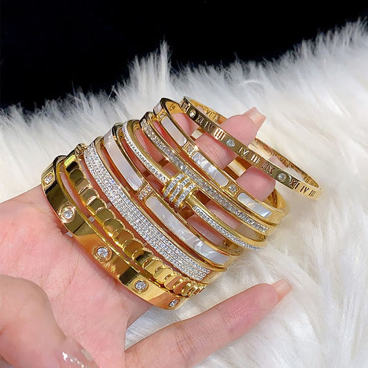 PULSERAS DE ACERO INOXIDABLE CON BAÑO DE ORO DE 18K VARIOS MODELOS