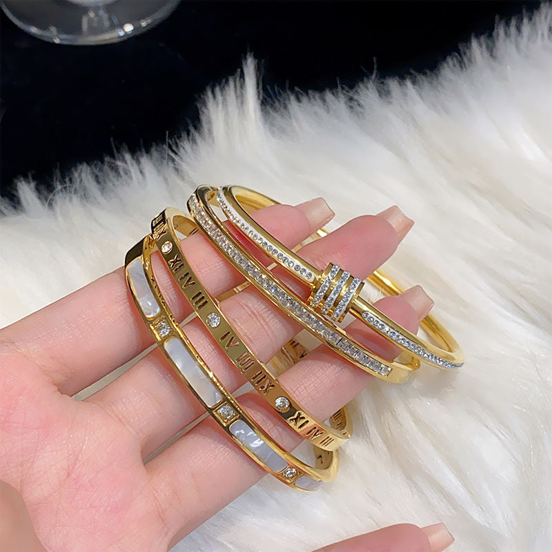 PULSERAS DE ACERO INOXIDABLE CON BAÑO DE ORO DE 18K VARIOS MODELOS