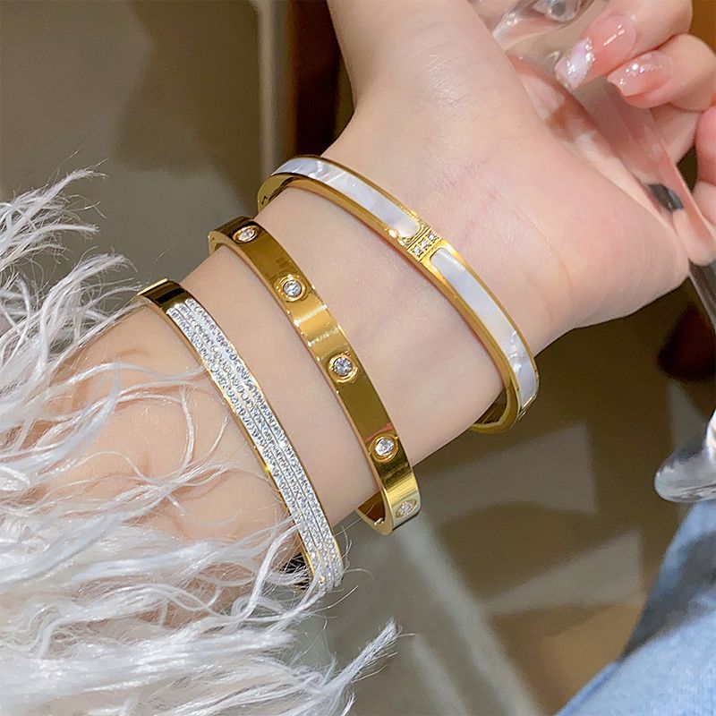 PULSERAS DE ACERO INOXIDABLE CON BAÑO DE ORO DE 18K VARIOS MODELOS
